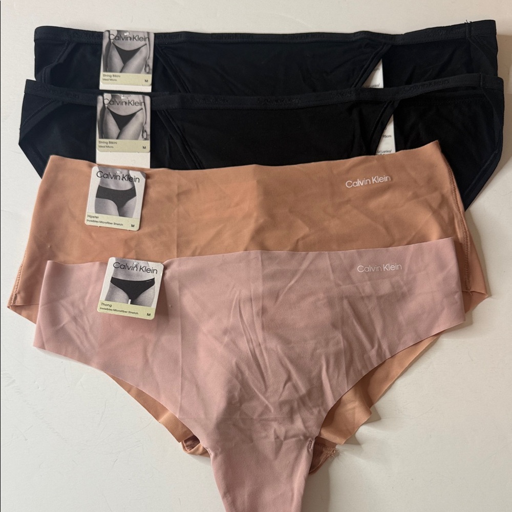 Calvin Klein Assortment of Panties 4 Pairs. Size Medium / 6